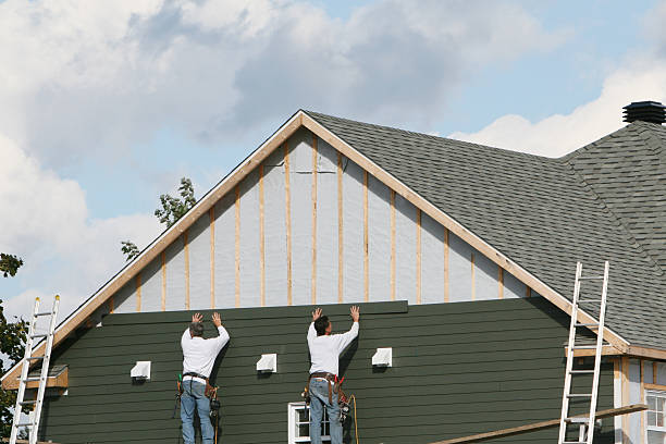 Professional Siding Installation technician working in North Andover, MA